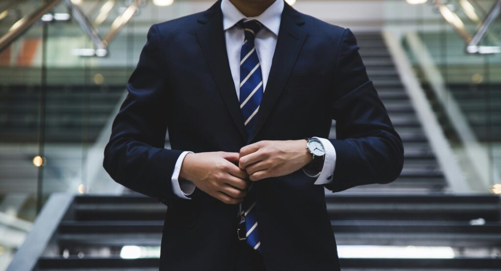 Man dressed in suit to show investment banking