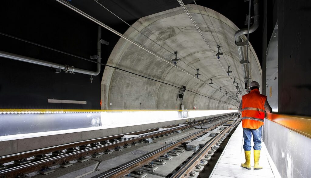 Man in tunnel with engineering degree